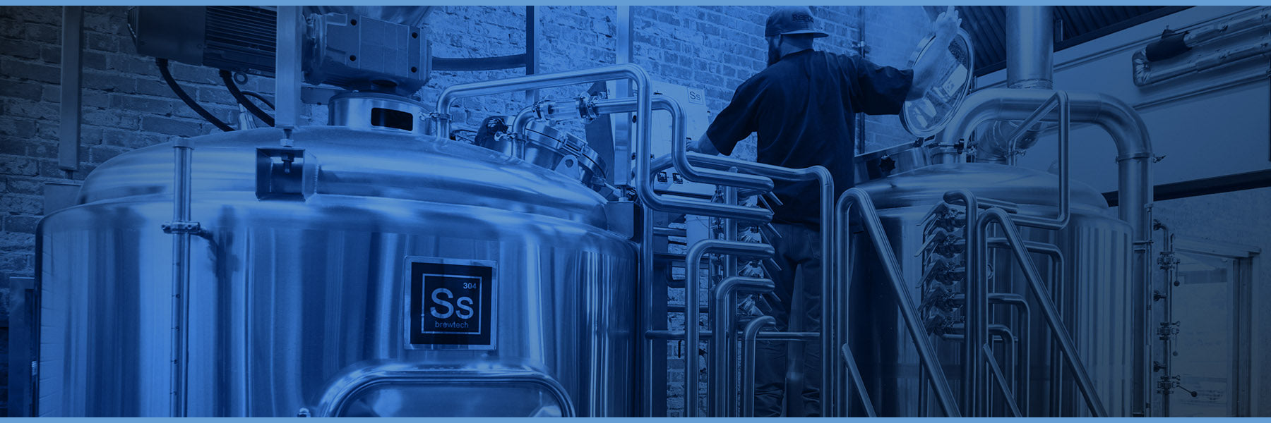 Photo of brewer at work using an Ss Brewtech Pro Brewhouse